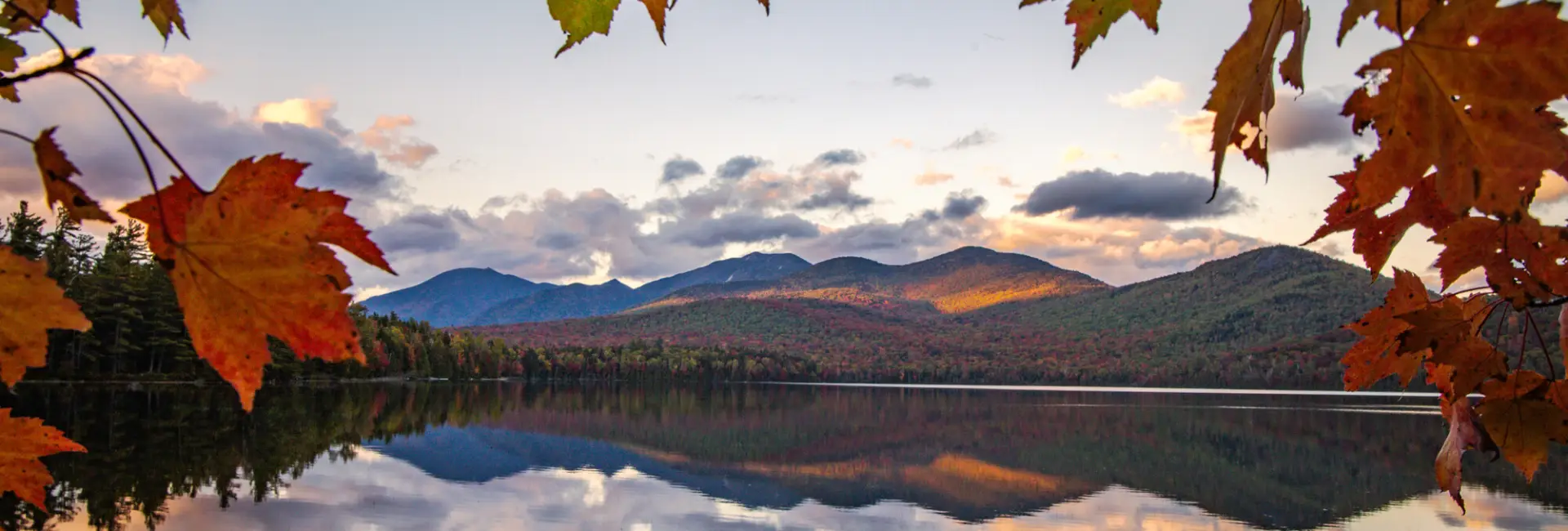 Hub fall foliage on the water.