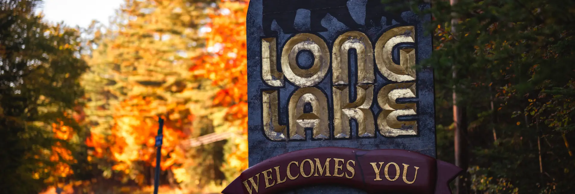 Long Lake welcome sign in the fall.