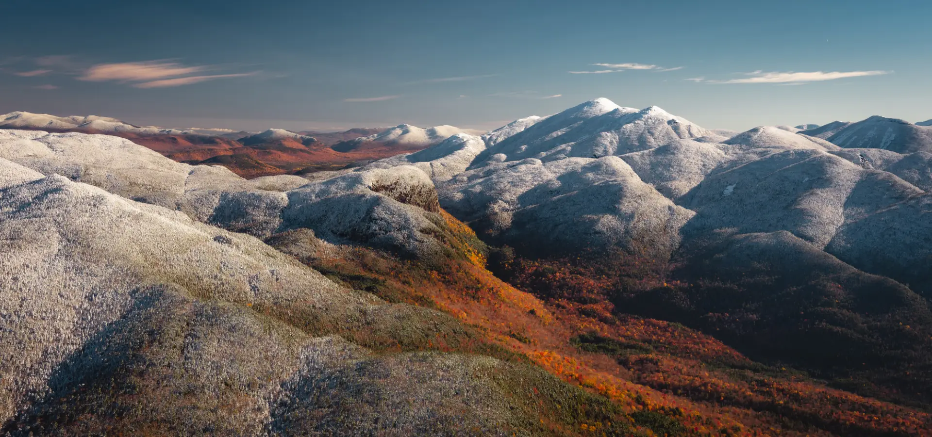 A mountain range in fall.,Winter in the Southern High Peaks.