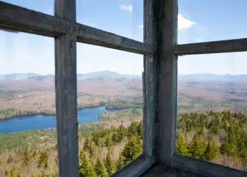 The view from the Goodnow Mountain firetower is one of the best in the Adirondacks., Hiking is a great group activity., Bring headlamps for dawn and dusk photos., The view start at the summit and go all the way up., Always sign the register&#44; before and after the hike., Clouds might lose distance&#44; but add photo depth., Many interesting artifacts of the past along the trail.