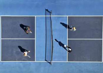 Aerial view of 4 people on a pickle ball court