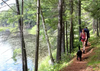 You'll need to bring a lightweight watercraft and carry it in on a hiking path.