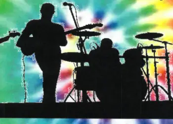 A silhouette of a person playing guitar and drums in front of a rainbow tie dye background
