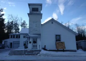 A snow blanketed exterior of the Grace Bible Fellowship
