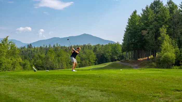 man golfing