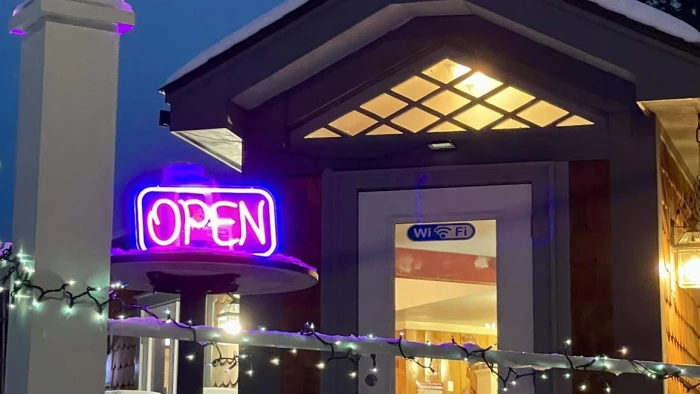 Waypoint Cafe front entrance at night 