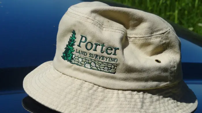 Bucket hat with Porter Land Surveying Logo embroidered