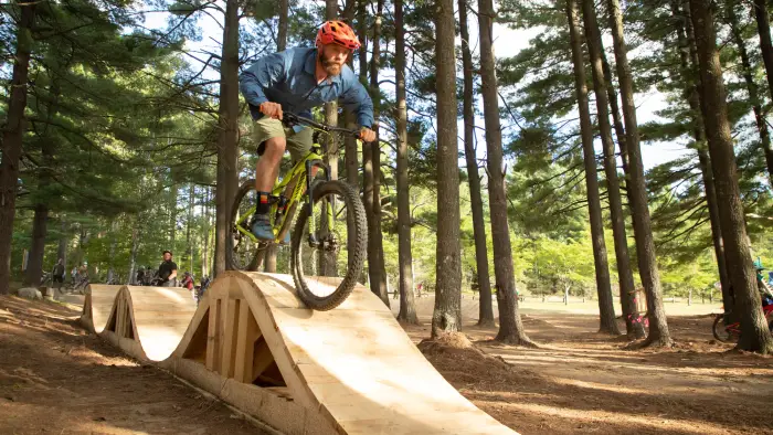 riding over wooded bump obsticles