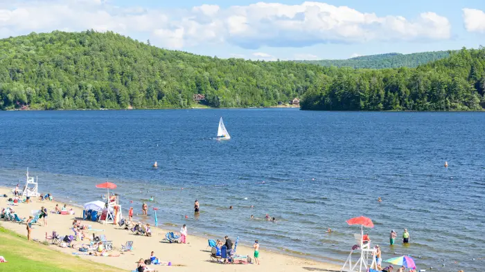 A beach lake bustling with people