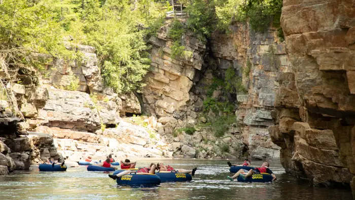 Float down the river in style with Ausable Chasm custom rafts