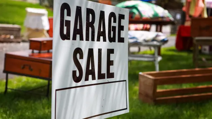 Garage Sale Sign in a yard
