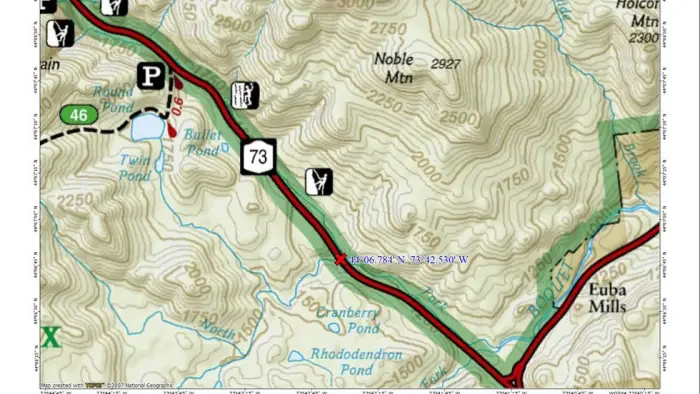 A map with a couple main roads and some trails