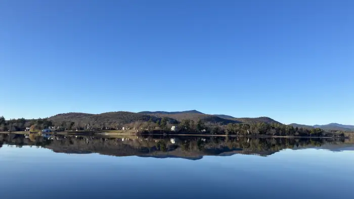A view of the Schroon Lake as smooth as glass