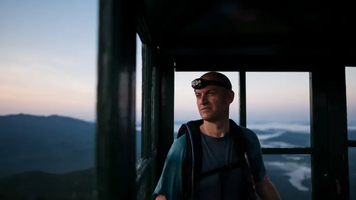 A man in Mount Adams firetower