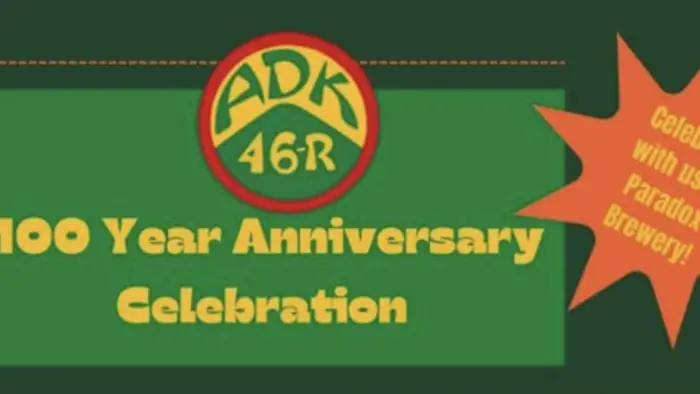 An illustration with gold letters on a green background reading '100 Year Anniversary Celebration