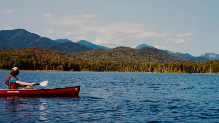 A person canoeing in the water