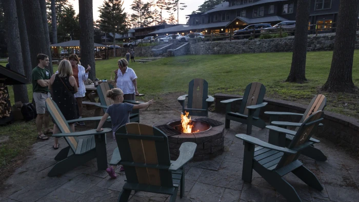 people gathered around a fire