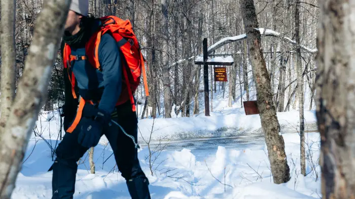 Snowshoer setting off to hike Moxham