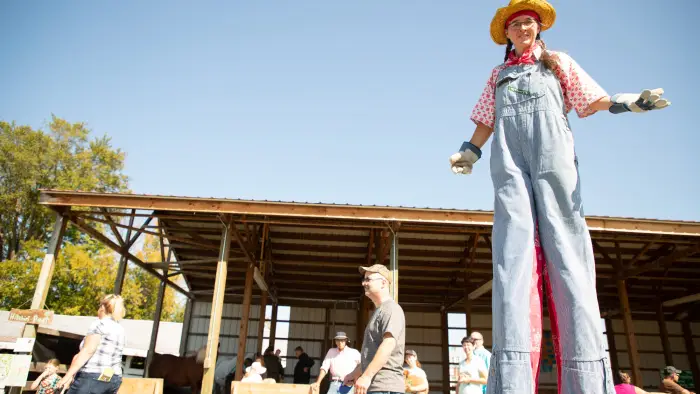 A woman on stilts