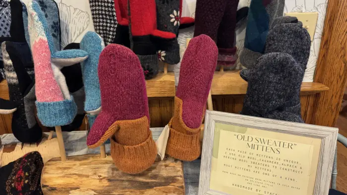 Exterior of the building with huge windows and the new sign yet to be hung.