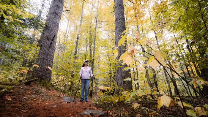 A woman hiking Mount Severance