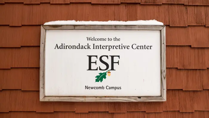 A small sign for the Adirondack Interpretive Center.