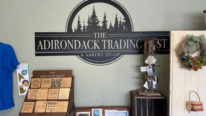 Full length of the building with huge windows and large parking area