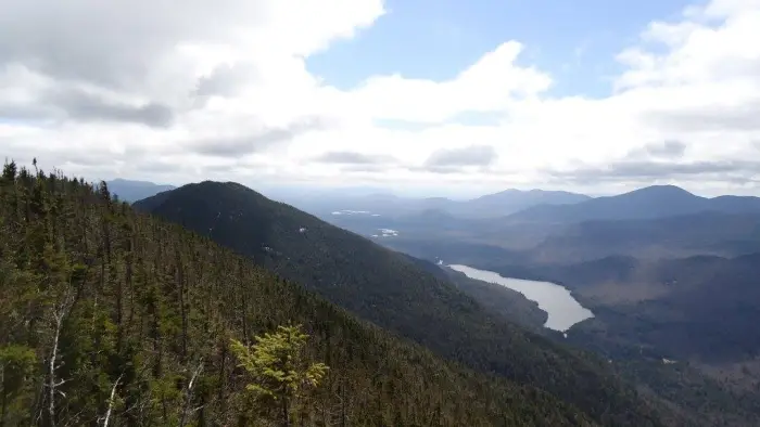 See Lower Ausable Lake from the summit of Mount Colvin.