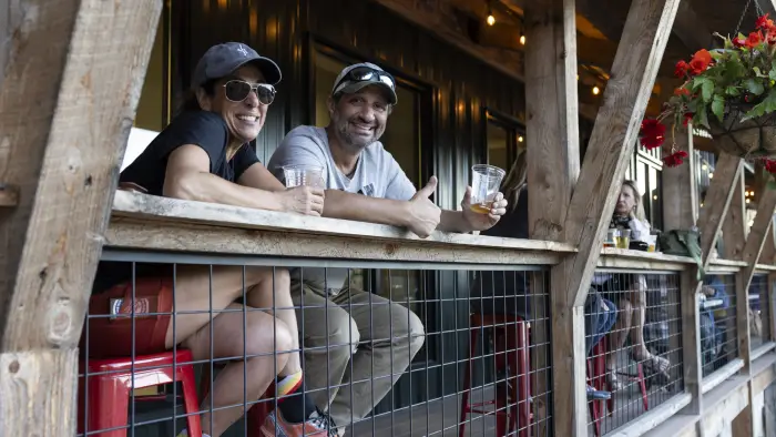 Participants enjoy a drink outside at Paradox Brewing