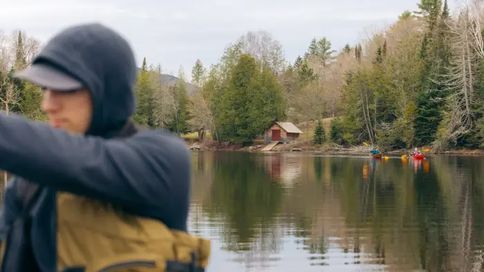 Paddlers on the water in stick season