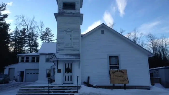 A snow blanketed exterior of the Grace Bible Fellowship