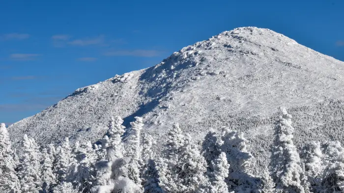 A snow-capped mountain dome