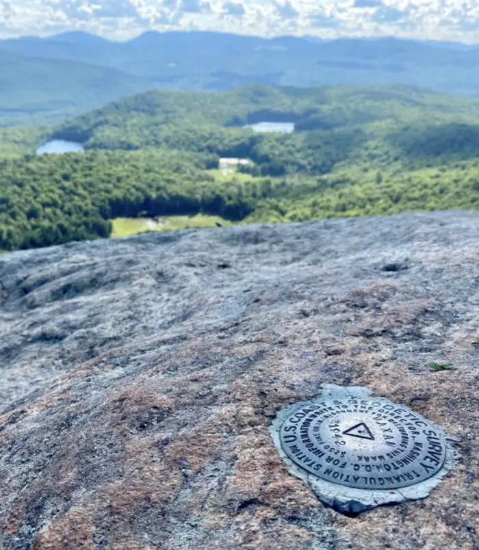 survey marker at summit with misspelled name; &quot;Maxam&quot; instead of Moxham