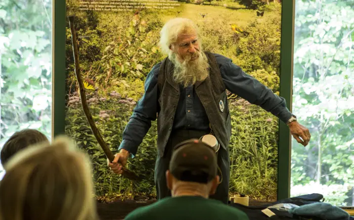 John Muir giving a lecture.