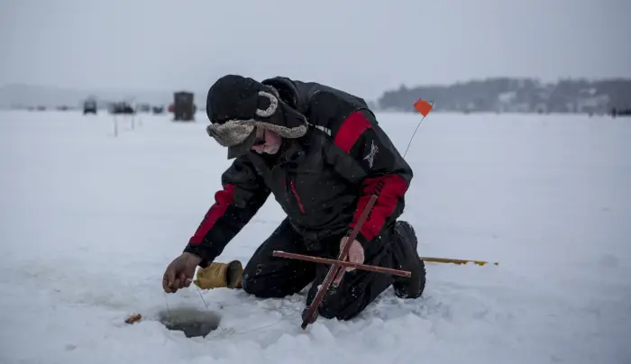 Steve Piatt holds his Schroon Lake laker