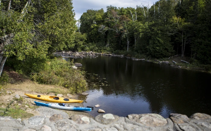 Two kayaks on the shore after some peaceful paddling