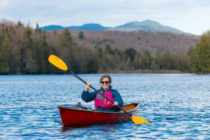 Woman kayaking on the river