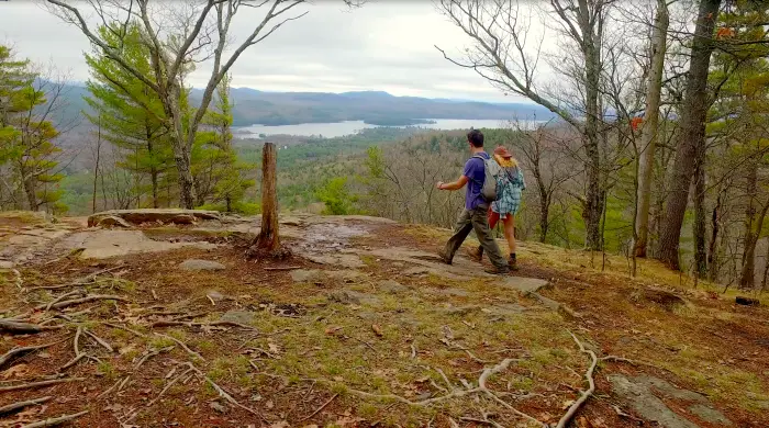 A couple hiking to the top of Mt. Severance