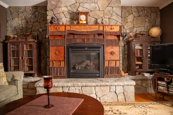 A fireplace in a lodge.