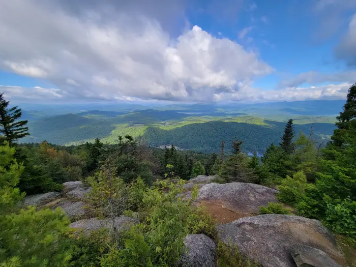 Rolling hills from a mountain summit on a cloudy day