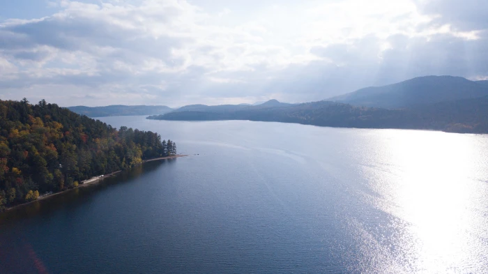 An aerial shot of Schroon Lake during fall