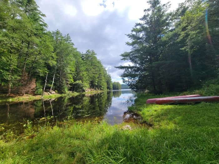 Two canoes at the waters edge