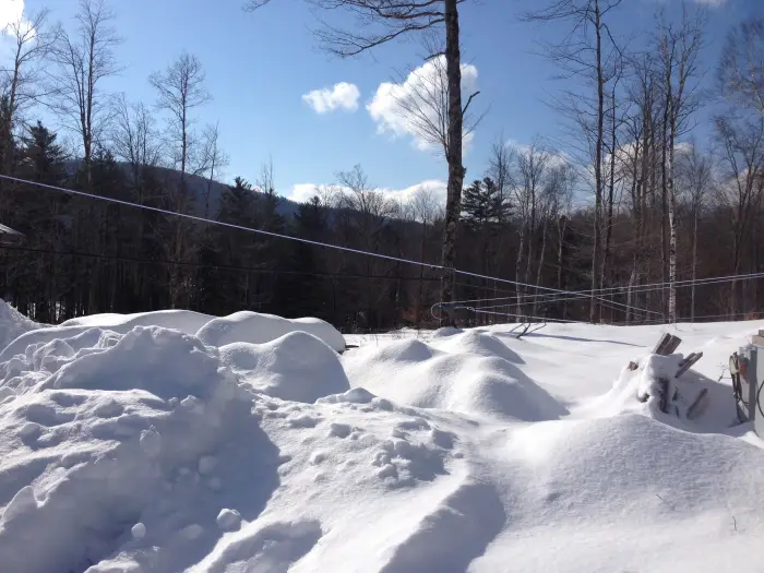 View of blue vacuum lines against Moxam Mountain Ridge.