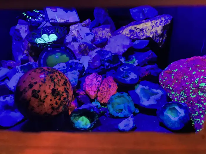 Minerals fluoresce under UV light.