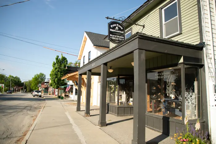 Exterior of a store on a small town Main Street on a sunny day.